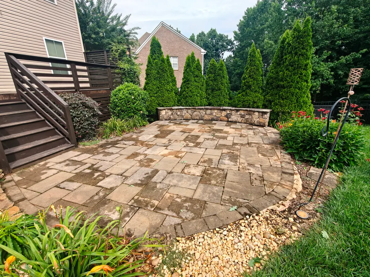 Paver patio cleaning — Concord, NC (before) by Soft Touch Softwash